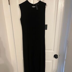 Black one piece evening wear. Size L.